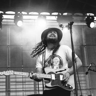 Left handed guitar player