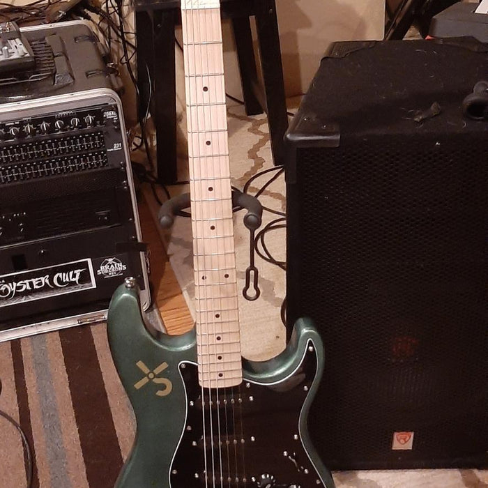 Customer-built ST-style guitar kit in dark green metallic finish — a completed DIY guitar kit build from Guitar Kit World