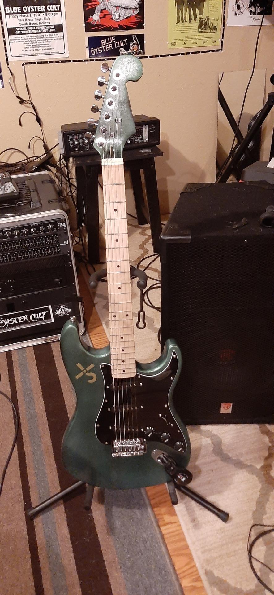 Customer-built ST-style guitar kit in dark green metallic finish — a completed DIY guitar kit build from Guitar Kit World