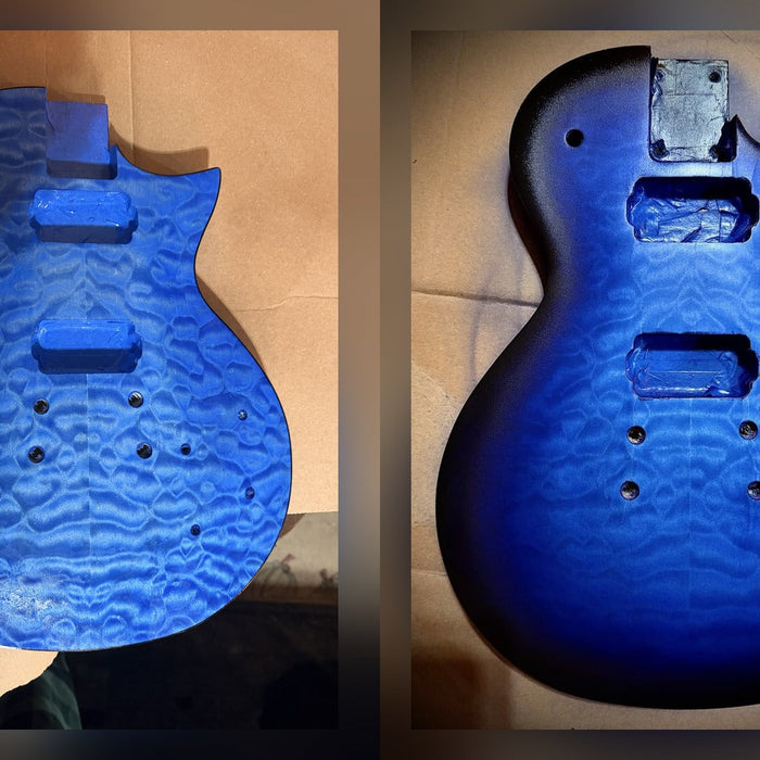 Quilted maple guitar body dyed bright blue beside the same body after a dark blue burst, figure still visible
