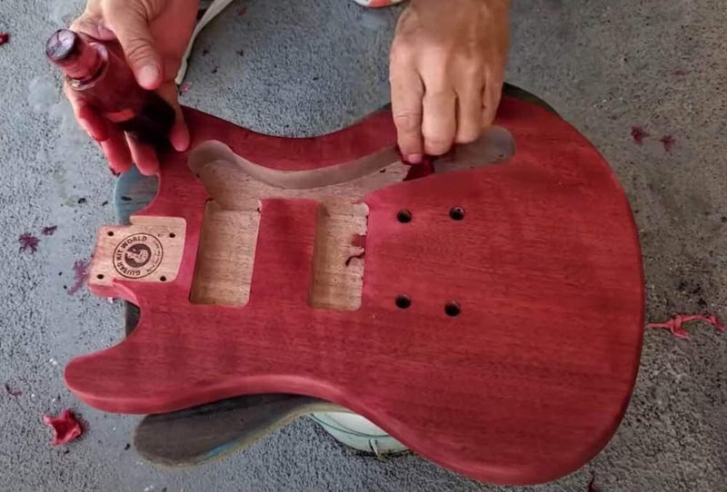 DIY offset-style guitar body being stained by builder Sean Jollie — Guitar Kit World
