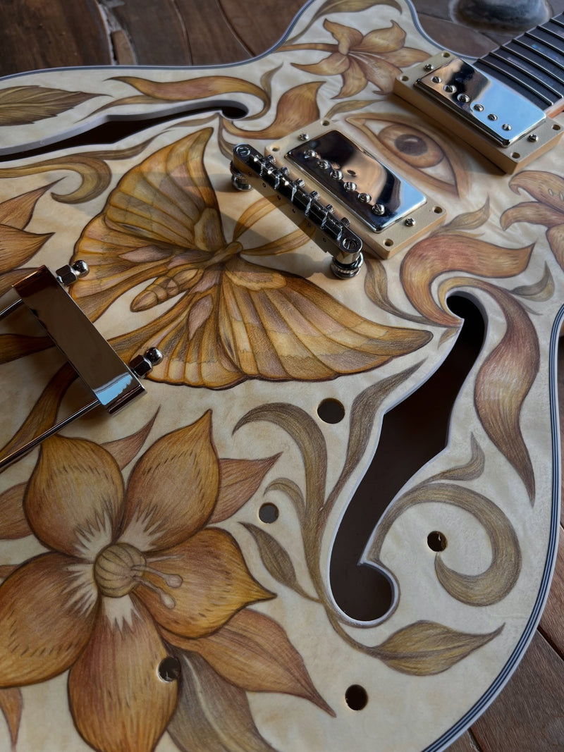 Close-up of the finished pencil drawing with wood grain showing through the color
