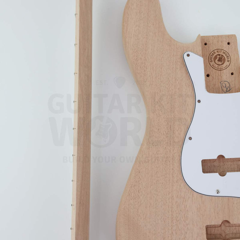 Bass neck edge beside the mahogany body and neck pocket