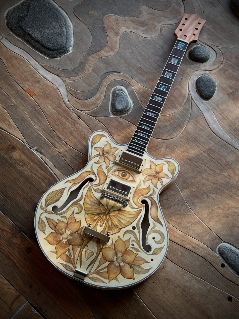 Full length view of the finished guitar, body and neck