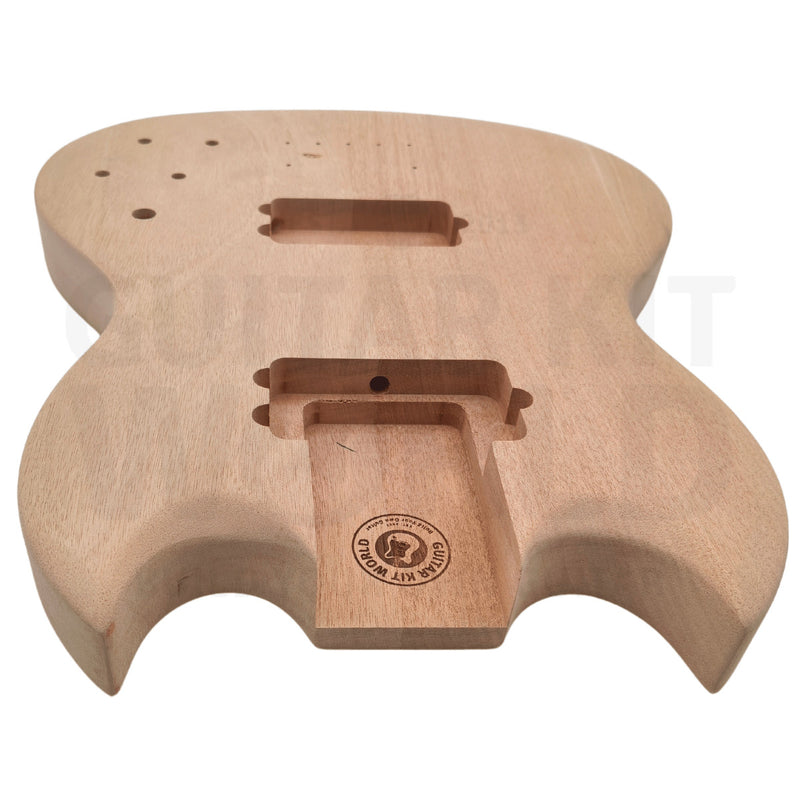 Devil-Horn mahogany bass body top view with Guitar Kit World brand stamp in neck pocket