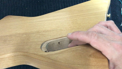 grounding guitar bridge