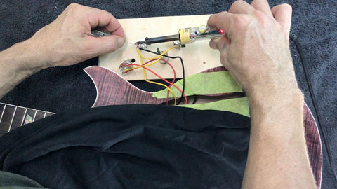 warming up soldering iron