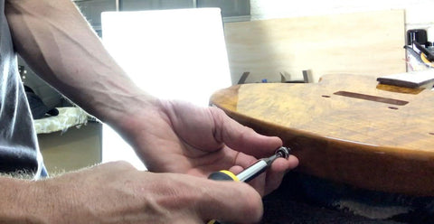 installing strap buttons