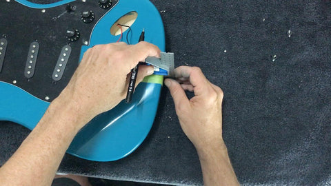 installing strap buttons