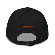 Black Grounded Dad Hat, orange stitched Guitar Kit World logo, back view with GROUNDED. stitched in orange