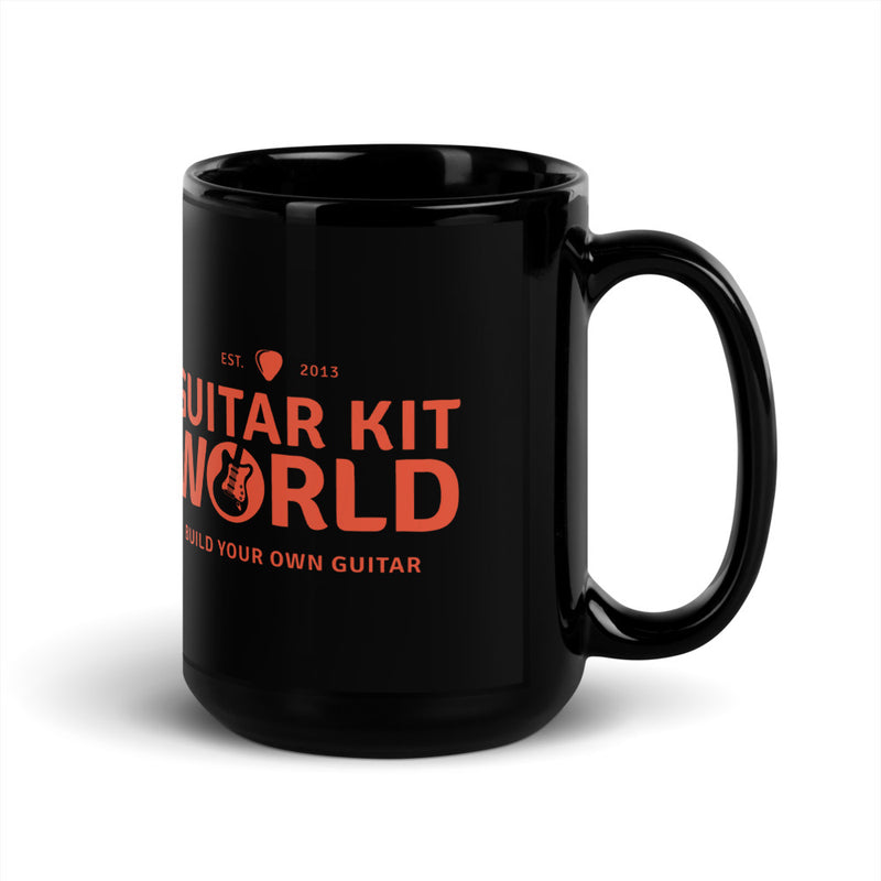 Builder's Coffee Mug, 15 oz, all black with an orange Guitar Kit World logo, handle on the right