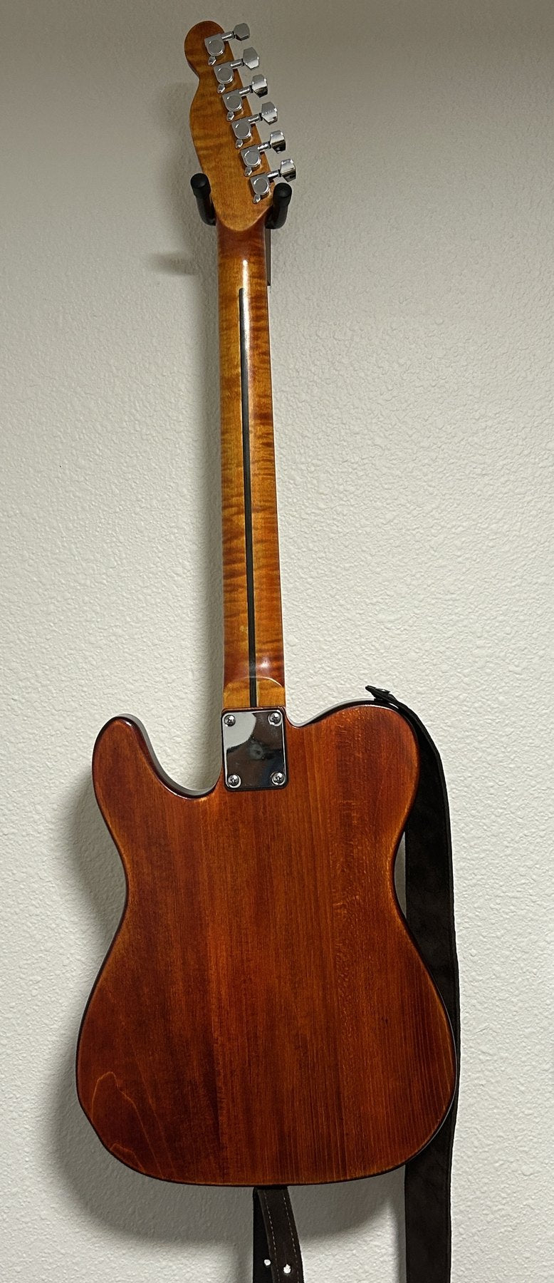 Finished quilted maple T-style DIY guitar with a tru oil finish