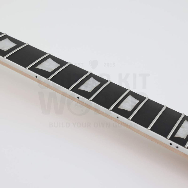 Bolt-on neck single-cutaway guitar kit with pre-wired electronics - fretboard close-up with white binding and white pearloid trapezoid inlays