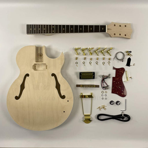 Hollow body DIY guitar kit complete flat lay with body, neck, gold hardware, and electronics
