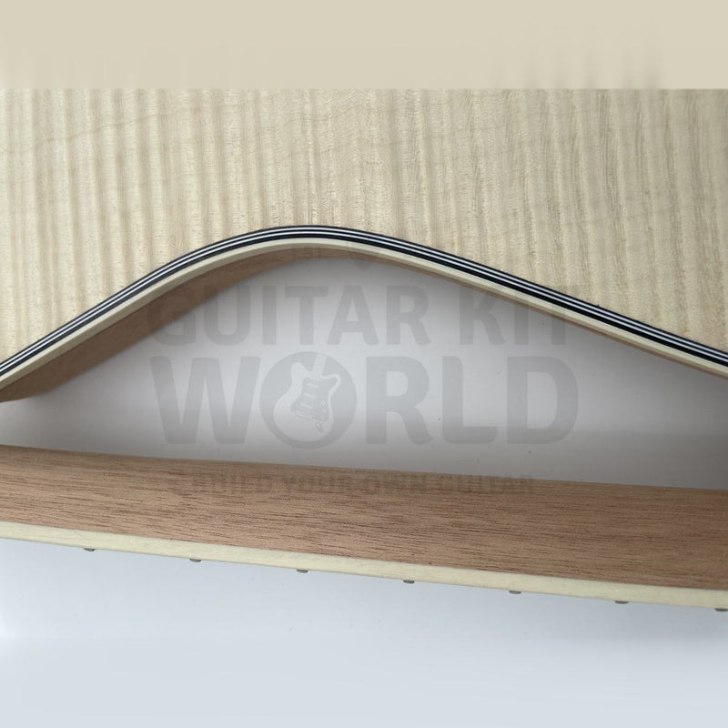 Close-up of the multi-ply ivory binding against the flamed maple veneer top - Guitar Kit World