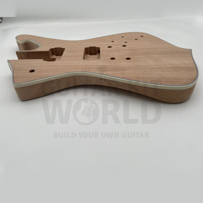 Side profile of the unfinished mahogany Hookline guitar body - Guitar Kit World