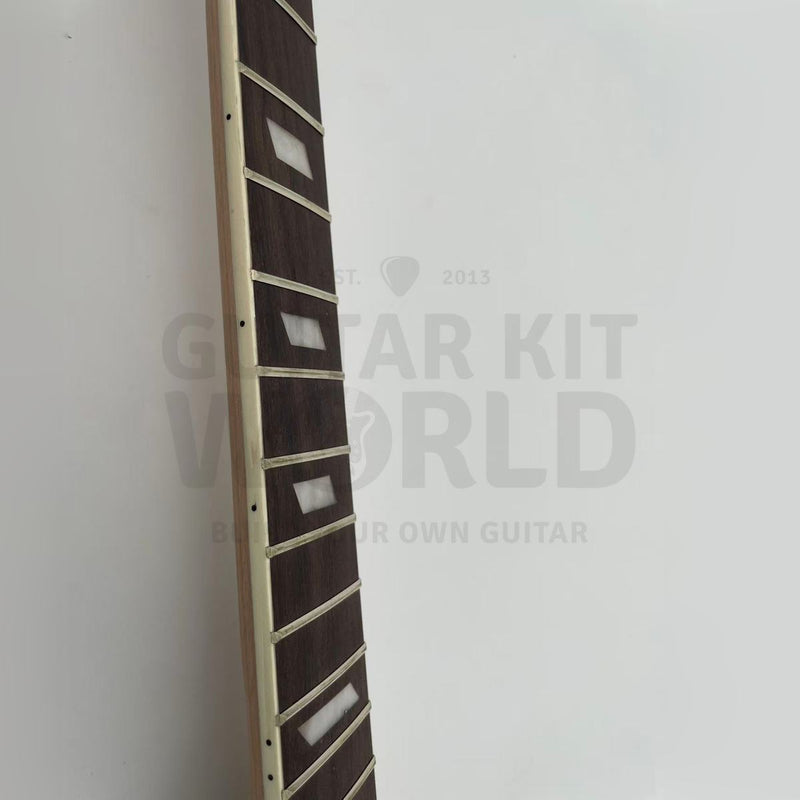 Close-up of pearl white parallelogram inlays on the rosewood fretboard - Guitar Kit World