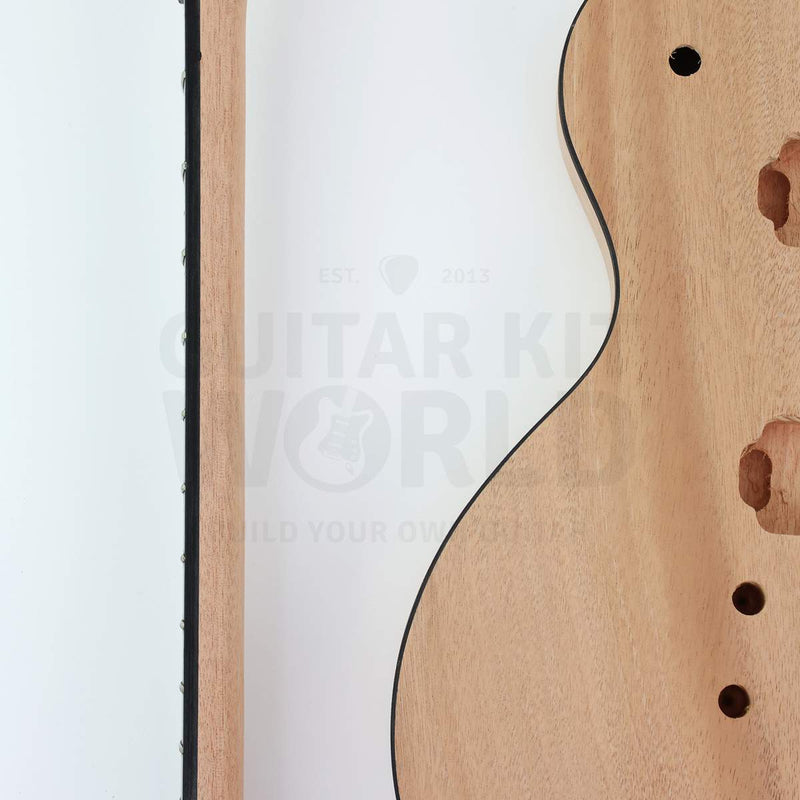 Close-up of the single black body binding on the mahogany top