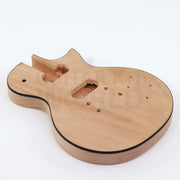 Single-cutaway guitar kit body angle showing the black top binding and neck pocket