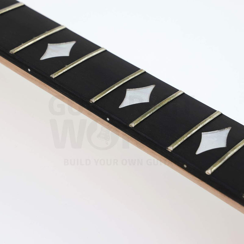 Close-up of White Pearloid diamond inlays and white side dots on the ebonized fretboard