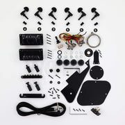 Single-cutaway guitar kit hardware: two black humbuckers, black tuners, adjustable bridge, stopbar tailpiece, black pickguard and cavity covers