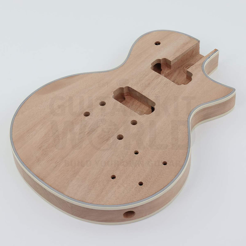 Single-cutaway guitar kit body angle showing the side output jack hole and ivory binding