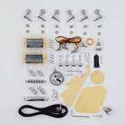 Single-cutaway guitar kit hardware: two chrome-covered humbuckers, chrome tuners, adjustable bridge, stopbar tailpiece, ivory pickguard