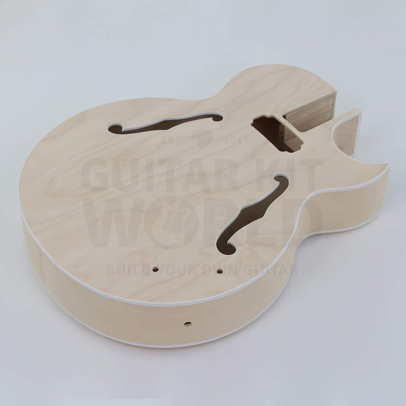 X-braced hollow body electric guitar kit, maple body, ebony fretboard - body angle with side output jack