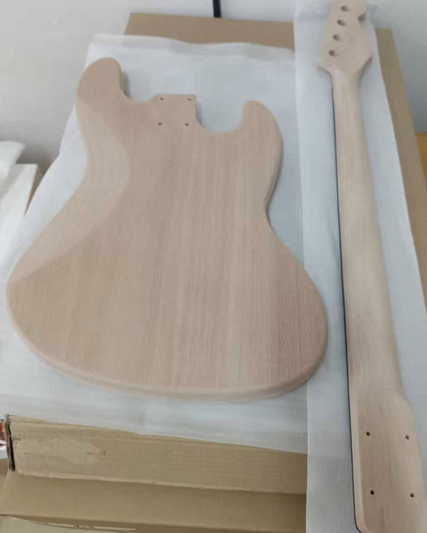 Back of the bare mahogany bass body and the back of the mahogany neck before any finish