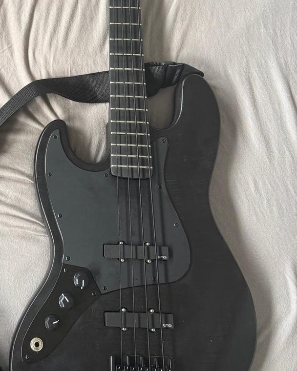 Finished left handed JM bass guitar kit in satin black with black hardware and black pickguard