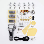 Kit hardware: three humbuckers, vibrato tailpiece, tuners, gold knobs