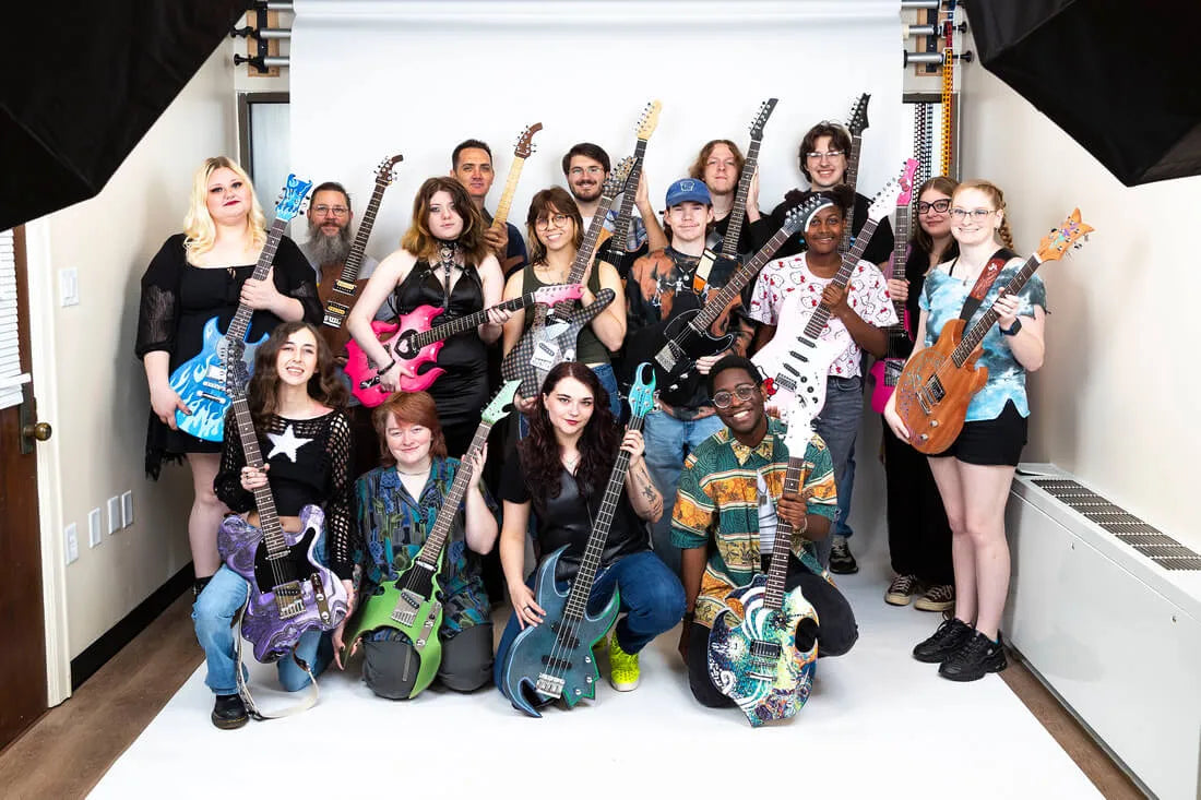 Southern Arkansas University students with their finished guitar builds